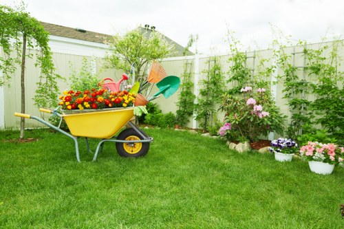 A landscaped garden design in Old Oak Common with paving and planting